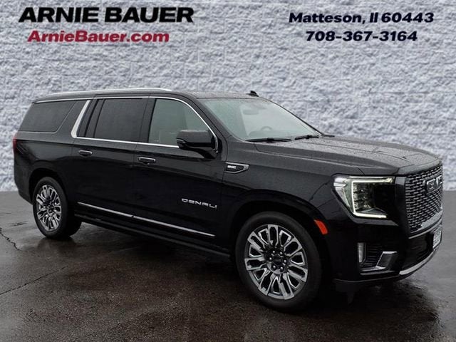 2024 GMC Yukon XL Denali Ultimate in Onyx Black — front three-quarter view